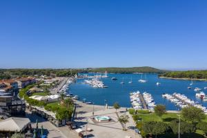 a view of a marina with boats in the water at Appartments Smrikve in Medulin