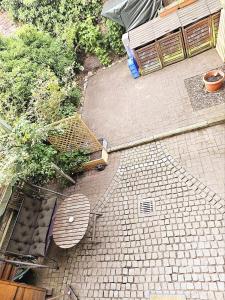 an overhead view of a patio with a bench at Ferienwohnung Till in Mölln