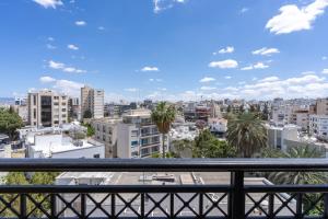 a view of a city from a balcony at STAY Cityscape Charm in Nicosia