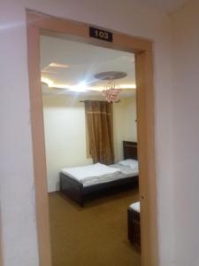 Cama o camas de una habitación en Guest INN Skardu