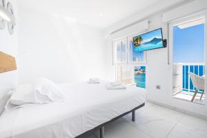 Postel nebo postele na pokoji v ubytování Veracruz 17-B Deluxe Apartament Levante Beach + 32 fotografií