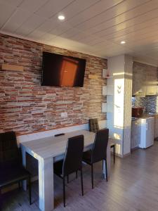 Kuchyň nebo kuchyňský kout v ubytování Estudio atico con piscina "Solsalou" Edificio Inter 2