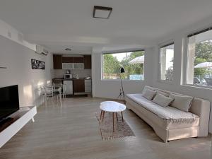 Et tv og/eller underholdning på Golden Sunset Apartments