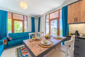 A kitchen or kitchenette at Pazar Apartments