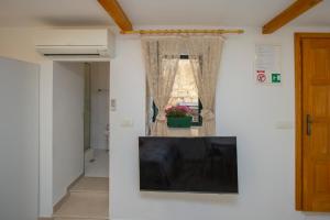 TV a/nebo společenská místnost v ubytování Hidden Gem in Old town