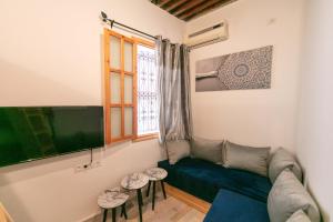 TV a/nebo společenská místnost v ubytování Casa Omaima