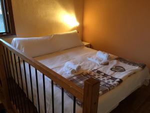 Un pat sau paturi într-o cameră la Cascina Battivacco
