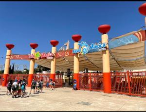 a ride at a theme park with a roller coaster at Pisito de la Lola Flores 2 in Santiponce