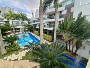 Bazén v ubytování Boulevard Bombinhas - Um condomínio Completo que vai te encantar nebo v jeho okolí