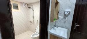 Koupelna v ubytování Zain Tabuk Apartment