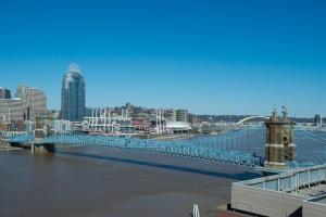 a bridge over a river with a city in the background at Cincinnati Marriott at RiverCenter in Covington