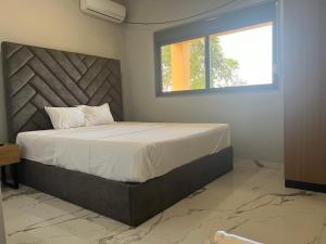 מיטה או מיטות בחדר ב-Canafistra Prestige Villa