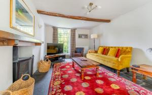 Гостиная зона в Peacock Cottage