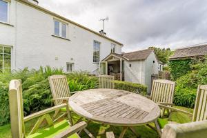 Сад в Peacock Cottage