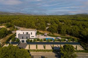 an aerial view of a house with a pool at Villa E&N in Brodarica