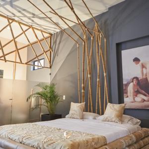 Кровать или кровати в номере Hotel Zensual