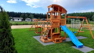 a playground with a slide at Perełka Kopań in Kopań