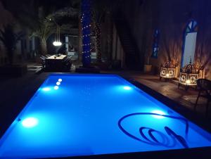 Bazén v ubytování Hotel Riad Sahara Activity nebo v jeho okolí
