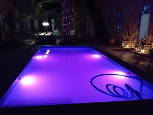Bazén v ubytování Hotel Riad Sahara Activity nebo v jeho okolí