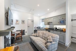 Kuchyň nebo kuchyňský kout v ubytování Riverside Cottage