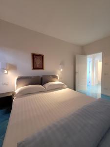 Ένα ή περισσότερα κρεβάτια σε δωμάτιο στο Heaven Oasis near Sorrento & Capri - Masseria Torca "Lì Galli"