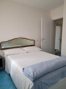 Ένα ή περισσότερα κρεβάτια σε δωμάτιο στο Heaven Oasis near Sorrento & Capri - Masseria Torca "Lì Galli"