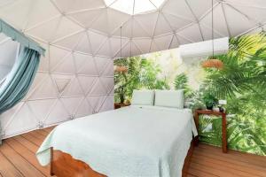 Letto o letti in una camera di Ubuntu Glamping