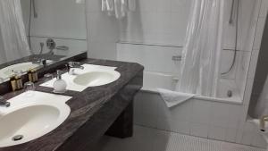 Kylpyhuone majoituspaikassa Hotel Unger