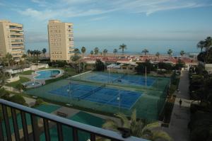 a view of a tennis court from a balcony at URBANOVA 1 in Alicante