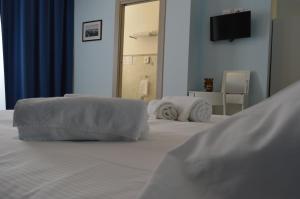 Posteľ alebo postele v izbe v ubytovaní B&b Bagheria