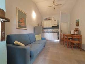 A kitchen or kitchenette at Casa di Giò - Bilocale con giardino