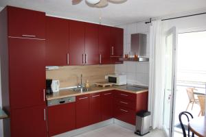 Kuchyňa alebo kuchynka v ubytovaní Villa Jana Apartments