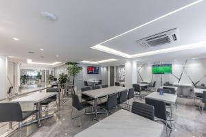TV a/nebo společenská místnost v ubytování Hotel Biltmore