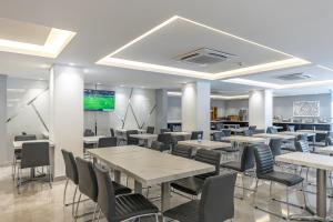 TV a/nebo společenská místnost v ubytování Hotel Biltmore