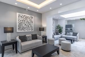 a living room with a couch and a table at Hotel Biltmore in Guatemala