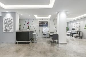 TV a/nebo společenská místnost v ubytování Hotel Biltmore