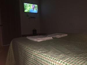 Una cama o camas en una habitación de Oasis Isabel1