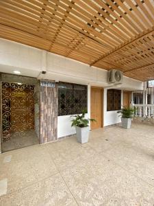 Fotografie z fotogalerie ubytování ApartaHotel Los Naranjos v destinaci Apartadó + 37 fotografií