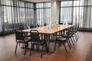 a large conference room with a long table and chairs at Fairfield by Marriott Inn & Suites Austin Downtown in Austin