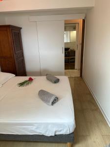 Letto o letti in una camera di Sur La Mer - Appartement Deux chambres à Schoelcher