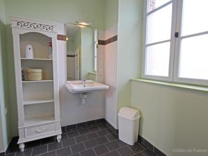 a bathroom with a sink and a mirror at Éco-presbytère rénové avec jardin, idéal pour 7 personnes - La Gonfrière, Normandie - FR-1-497-78 in La Gonfrière +20 photos