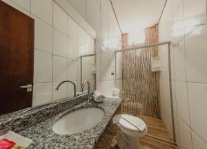 Koupelna v ubytování Pousada Iguassu Charm Suites