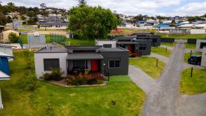 an overhead view of a row of houses in a suburb at Tasman Holiday Parks - Albany in Albany