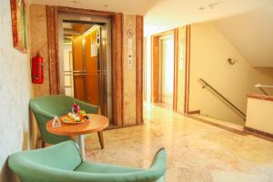 Posezení v ubytování Pine House by Werde Hotels