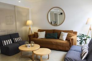 Uma área de estar em Abril Hotel Boutique