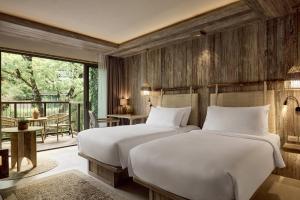 Dinso Resort & Villas Phuket, Vignette Collection by IHG客房内的一张或多张床位