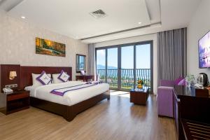 Letto o letti in una camera di Alani Sea View Hotel