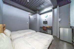 Ένα ή περισσότερα κρεβάτια σε δωμάτιο στο 新橙居