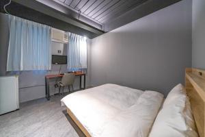 Ένα ή περισσότερα κρεβάτια σε δωμάτιο στο 新橙居
