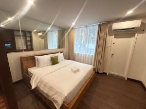 Postel nebo postele na pokoji v ubytování Makati Medical City Accommodation + 11 fotografií